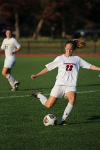 Abby Crowley '19 delivers the ball into the box